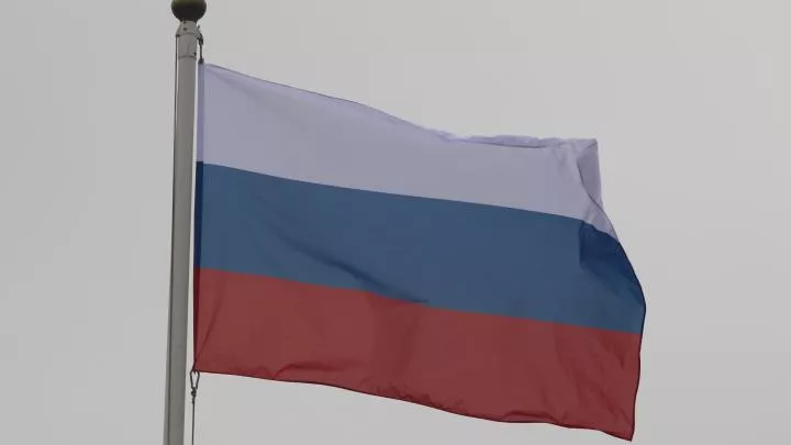 В Мариуполе и Мелитополе развернули самые большие флаги России 